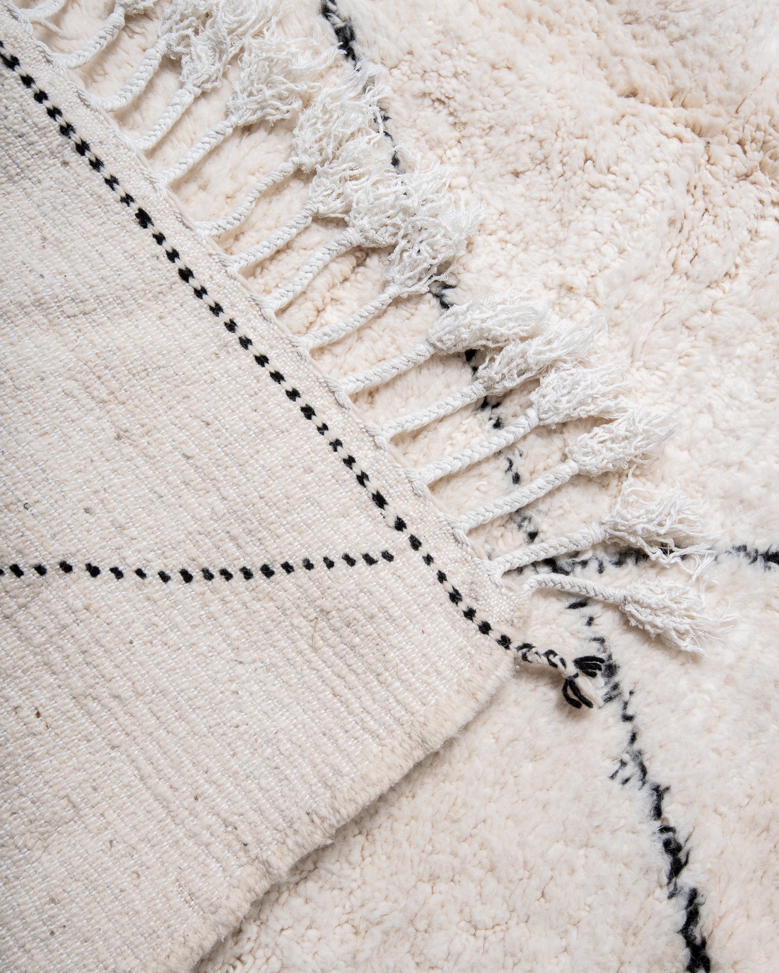 Modern, designer, handcrafted Berber rug from Morocco. Beniourain carpet with beautiful colours and patterns and fluffy wool texture.